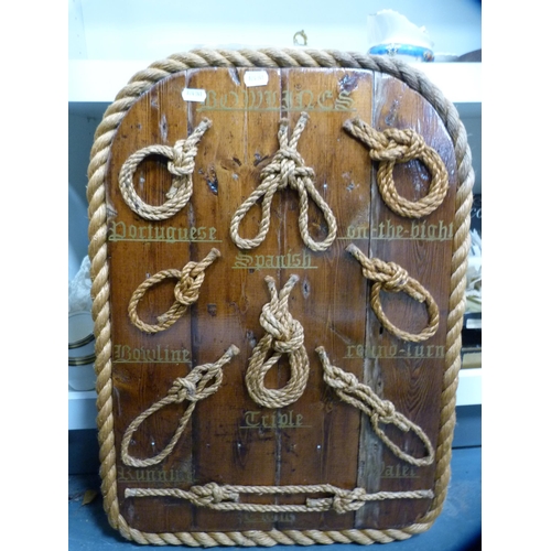 143 - Three knot wall plaques.