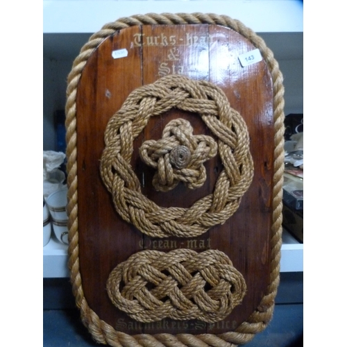 143 - Three knot wall plaques.