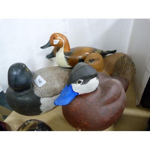 149 - Five carved and painted wooden ducks.