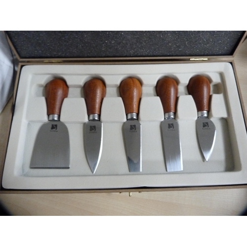 151 - Four cased sets of EP cutlery and three other boxed sets.