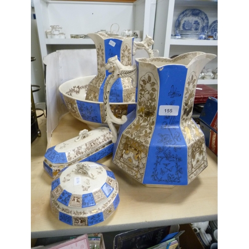 155 - Blue and gilt five-piece wash set.