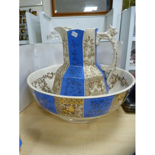 155 - Blue and gilt five-piece wash set.