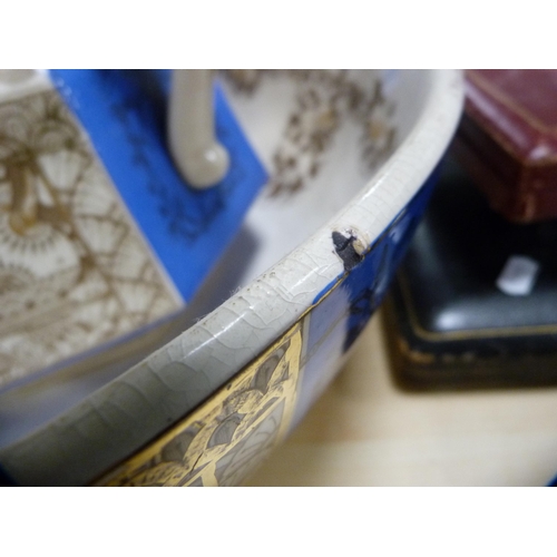155 - Blue and gilt five-piece wash set.