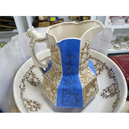 155 - Blue and gilt five-piece wash set.