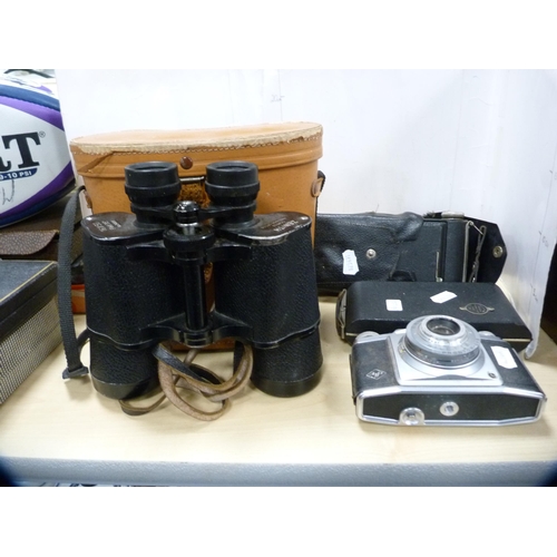 163 - Cased set of Zenith binoculars and cameras.