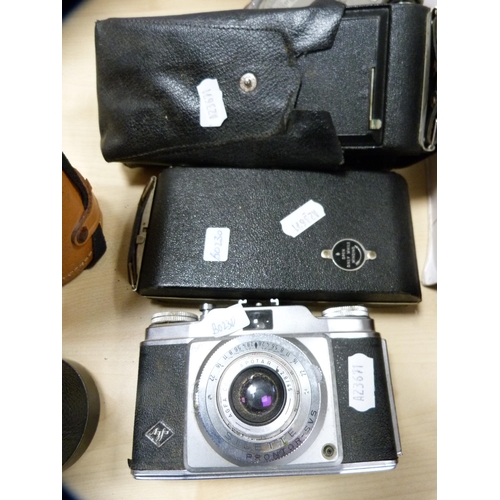 163 - Cased set of Zenith binoculars and cameras.