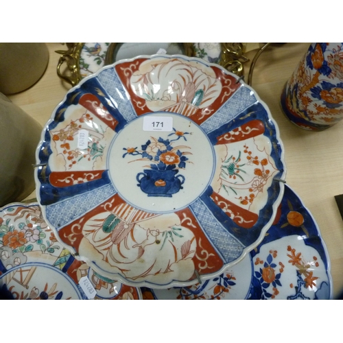 171 - Three Japanese Imari chargers.