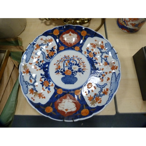 171 - Three Japanese Imari chargers.