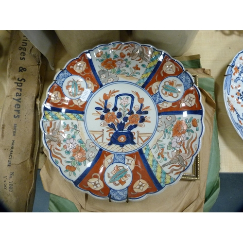 171 - Three Japanese Imari chargers.