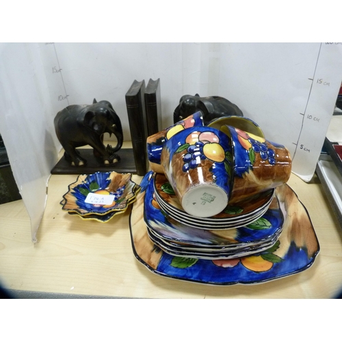 174A - Pair of elephant bookends and a part Tunstall tea set.