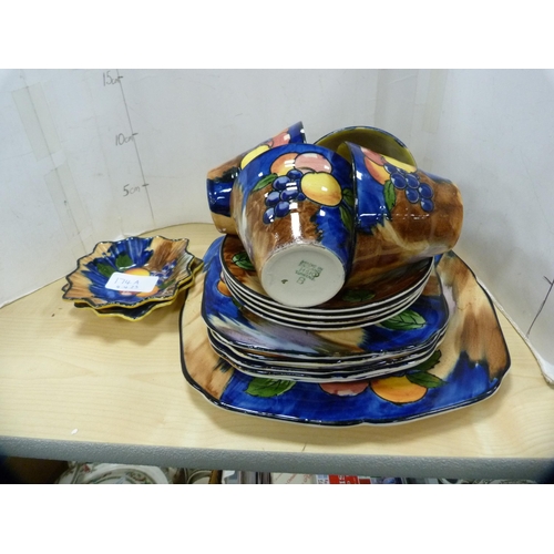 174A - Pair of elephant bookends and a part Tunstall tea set.
