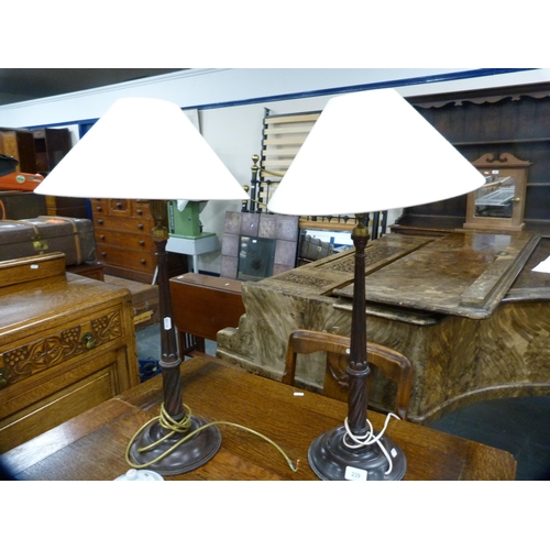 239 - Pair of Georgian-style mahogany table lamps with later shades.