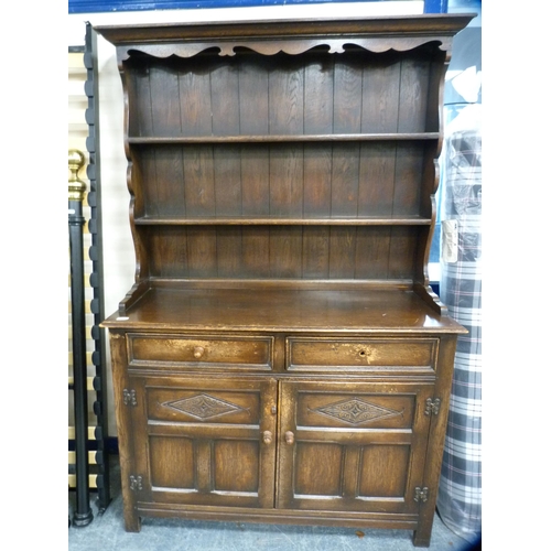410 - Oak dresser fitted with two drawers and panel door cupboards.