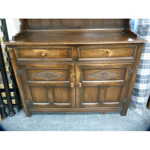 410 - Oak dresser fitted with two drawers and panel door cupboards.