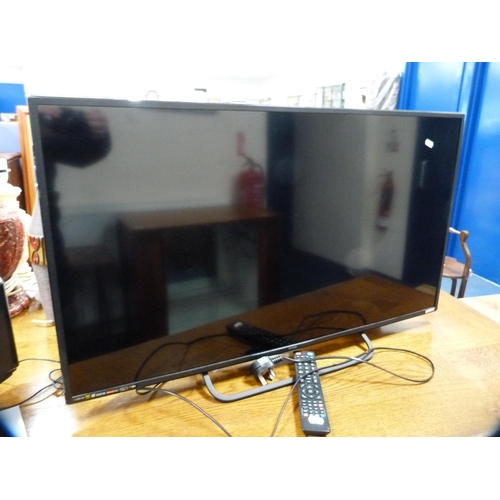 488 - Technika 40in television and a 15in Goodmans television, both with remotes.