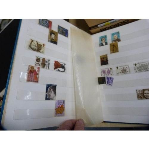 152 - Three albums including stamps.