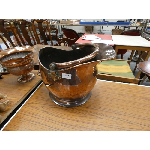 387 - Large copper helmet shaped coal bucket.