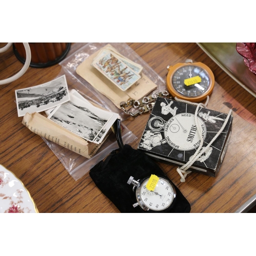 395 - Two Smith's stopwatches, cigarette cards, a circular dish, with similar table lamp.