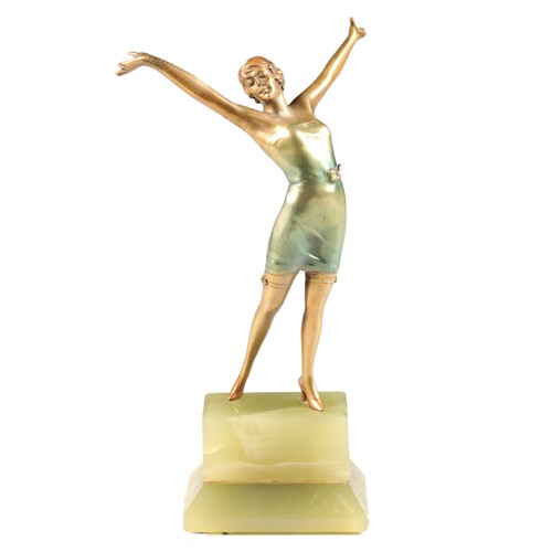 Josef Lorenzl (Austrian1892-1950) Art Deco painted bronze of a young lady with outstretched arms, signed to shoe R. Lor circa 1925, raised on a green onyx plinth, total height 18.5cm