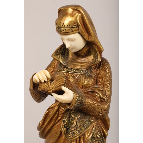 234 - After Albert Carrier - Belleuse (French 1824-1887) gilt bronze figure of a woman reading from a book... 