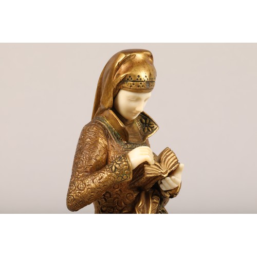 234 - After Albert Carrier - Belleuse (French 1824-1887) gilt bronze figure of a woman reading from a book... 