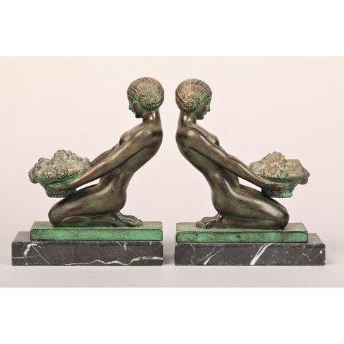 232 - Max Le Verrier (French 1892-1962) Pair Art Deco bronze figures, of a maiden with a basket of fruit s... 