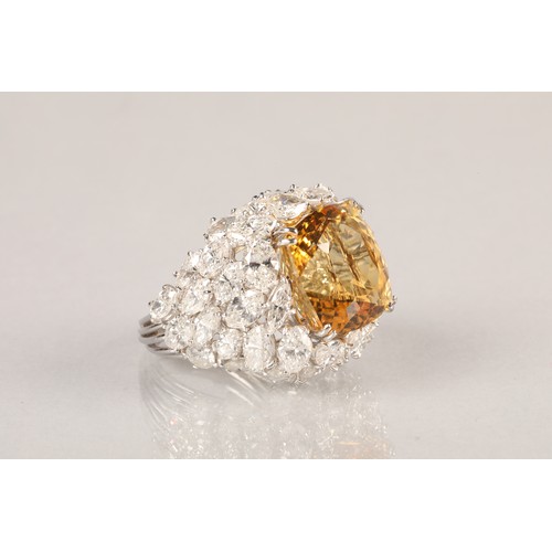 72 - Platinum diamond and citrine ring, set with 42 marquise cut diamonds, total approximately 12 carats,... 