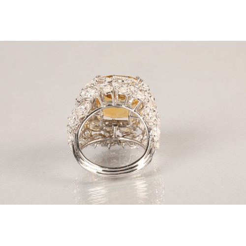 72 - Platinum diamond and citrine ring, set with 42 marquise cut diamonds, total approximately 12 carats,... 