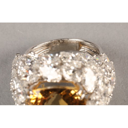 72 - Platinum diamond and citrine ring, set with 42 marquise cut diamonds, total approximately 12 carats,... 