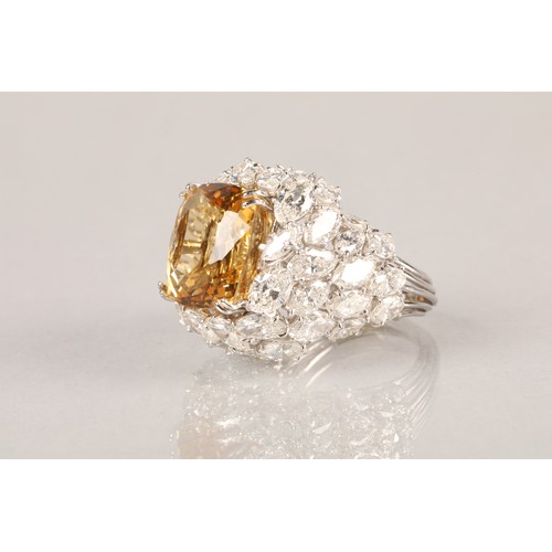 72 - Platinum diamond and citrine ring, set with 42 marquise cut diamonds, total approximately 12 carats,... 