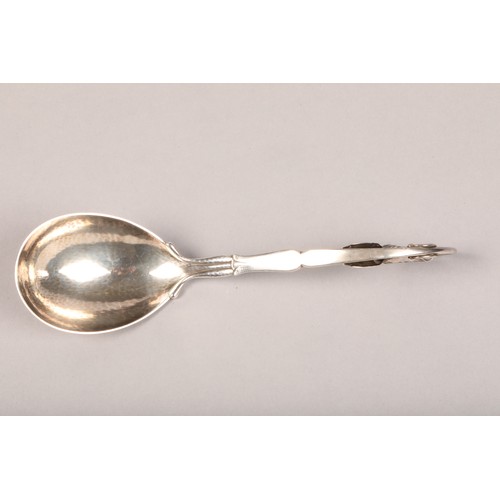 183 - Boxed set of three Georg Jensen Silver serving spoons, with scrolled handles with leaf finials, hamm... 