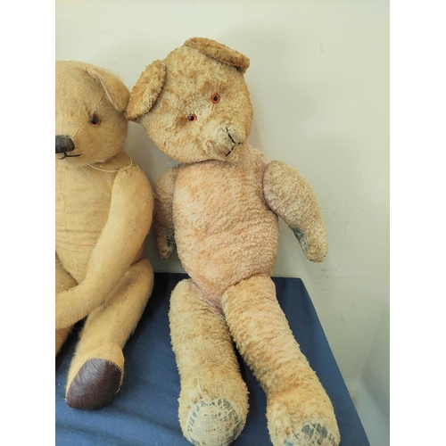 50 - Three early to mid 20th century mohair teddy bears with articulated limbs, including two with growle... 