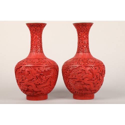 26 - Pair 19th Century Chinese carved cinnabar lacquer vases, baluster form, decorated with Chinese drago... 