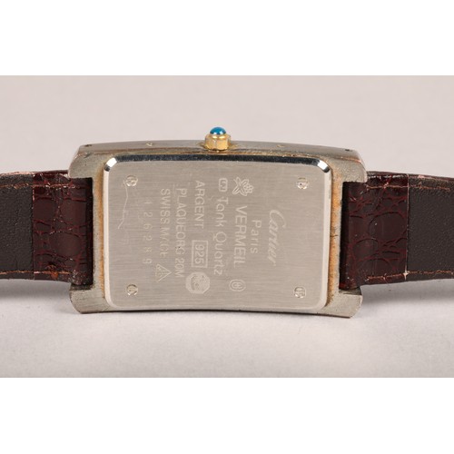 132 - Gents Cartier silver tank quartz wrist watch, rectangular silver dial with roman numeral hour marker... 