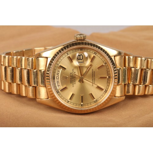 124 - 18 carat gold gents Rolex Oyster Perpetual day date, numeric wrist watch, champagne dial with applie... 