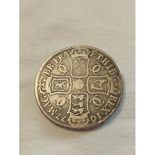 163 - United Kingdom. Charles II 1677 silver crown third bust. OBV draped bust facing right. REV crowned c... 