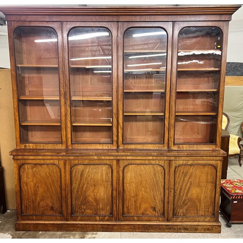 584 - 19th century mahogany bookcase, four glazed doors over four cupboard doors, shelved interior, length... 