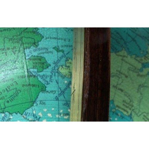 556 - Georama limited terrestrial globe scale 1:17,000,000 mounted on a rosewood stand raised on bun feet ... 