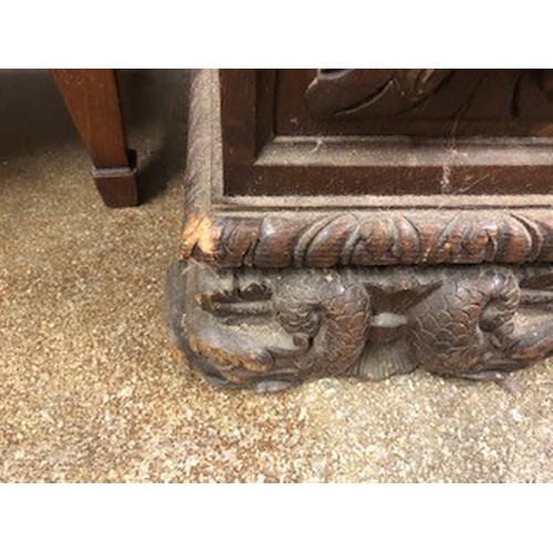 558 - Victorian carved oak settle/monks bench, with carved figure panelled back above, lift up seat flanke... 