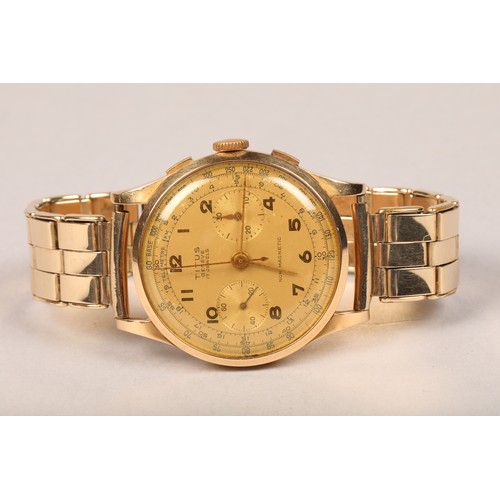 128 - Gents 18 carat gold Titus Chronograph wrist watch on a rolled gold strap