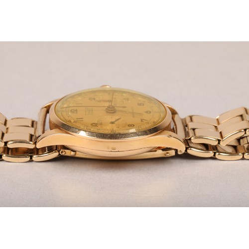 128 - Gents 18 carat gold Titus Chronograph wrist watch on a rolled gold strap