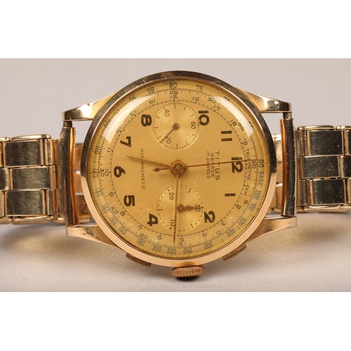 128 - Gents 18 carat gold Titus Chronograph wrist watch on a rolled gold strap