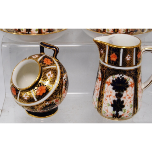 224 - Royal Crown Derby Imari porcelain coffee set comprising six saucers, 10.5cm diameter, six coffee can... 