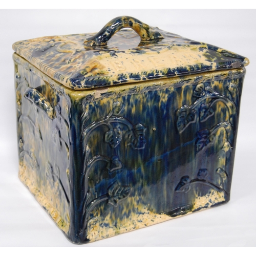 226 - Scottish pottery bread bin and cover of rectangular shape glazed in mottled colours, 23cm high.