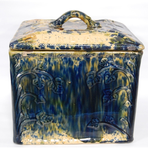 226 - Scottish pottery bread bin and cover of rectangular shape glazed in mottled colours, 23cm high.