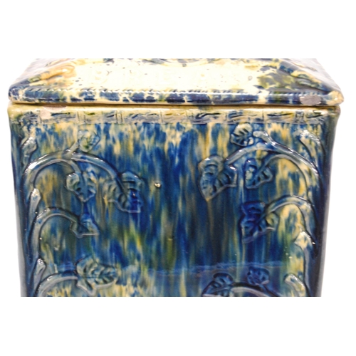 226 - Scottish pottery bread bin and cover of rectangular shape glazed in mottled colours, 23cm high.