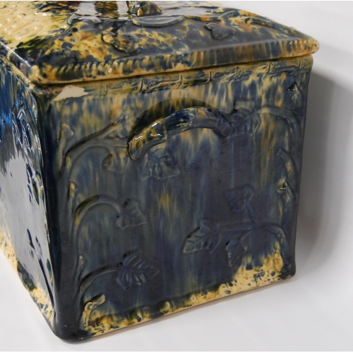 226 - Scottish pottery bread bin and cover of rectangular shape glazed in mottled colours, 23cm high.