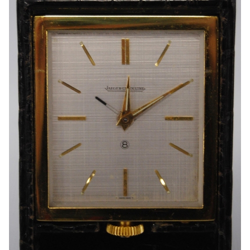 169 - Jaeger-LeCoultre timepiece/travel clock with silvered signed dial and gilt baton markers, 11cm high,... 