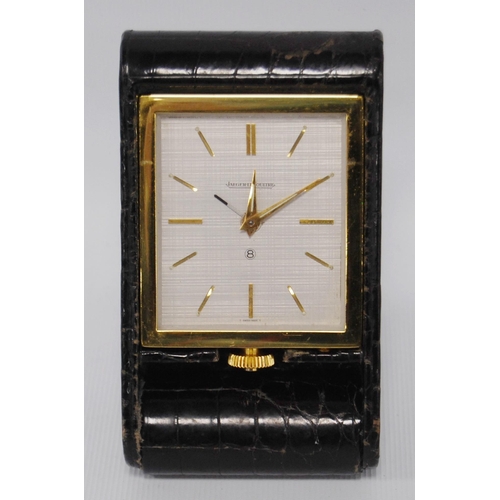 169 - Jaeger-LeCoultre timepiece/travel clock with silvered signed dial and gilt baton markers, 11cm high,... 