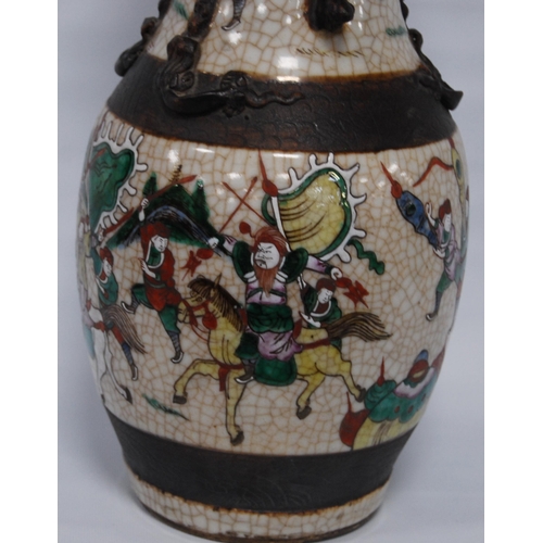 263 - Chinese crackle glazed vase (20th century) decorated with a battle scene in polychrome enamels, with... 